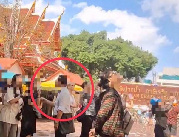 ตำรวจท่องเที่ยวบุกจับแพ็คคู่ไกด์เถื่อนเวียดนาม- ซิตติ่งไกด์  กลางวัดดังย่านภาษีเจริญ